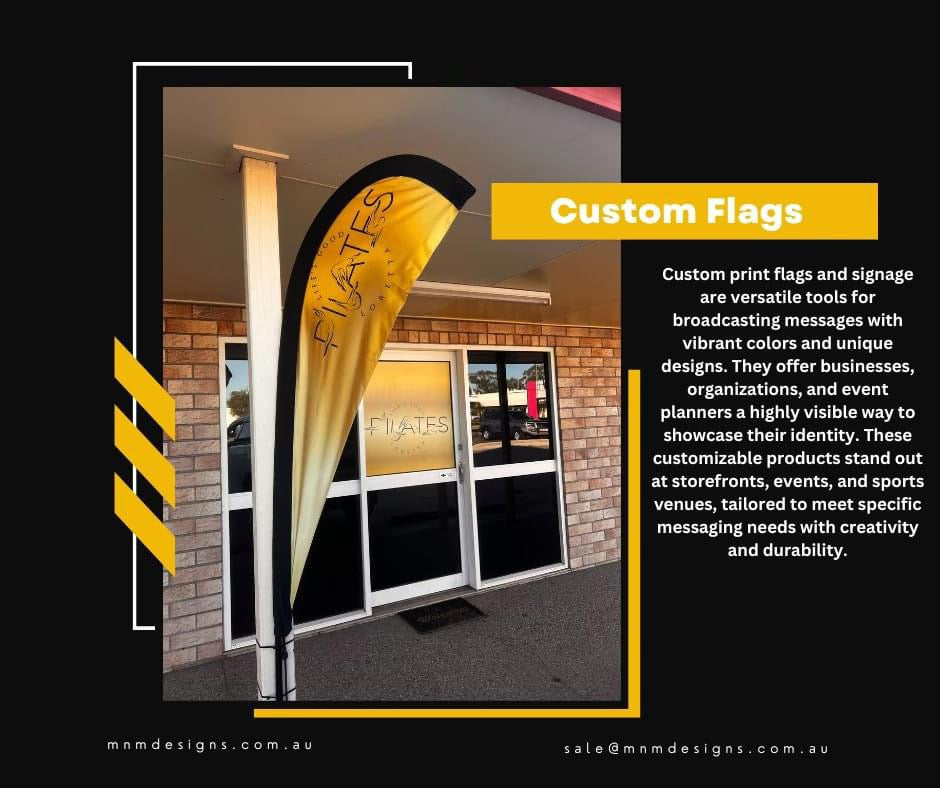 Yellow custom flag outside a building with text about custom flags and signage.