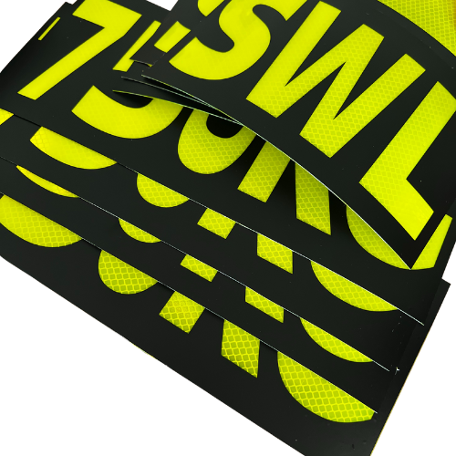 Custom call sign decal on mining vehicle – durable, weatherproof signage for equipment and worksite safety